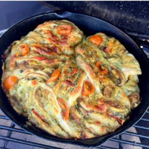 Rollo de masa trenzada de caprese